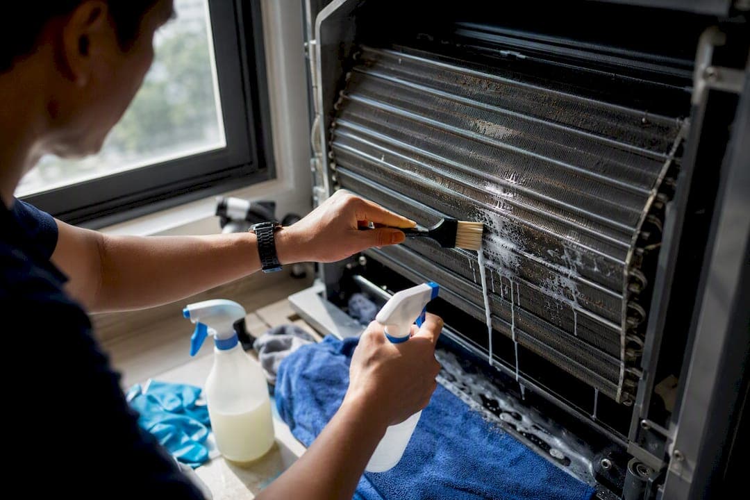 How do you clean air conditioner units to a professional standard?